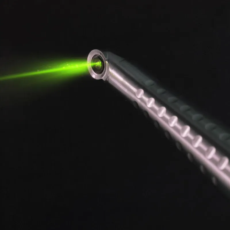 Fotona laser handpiece projecting a precise green pilot beam
