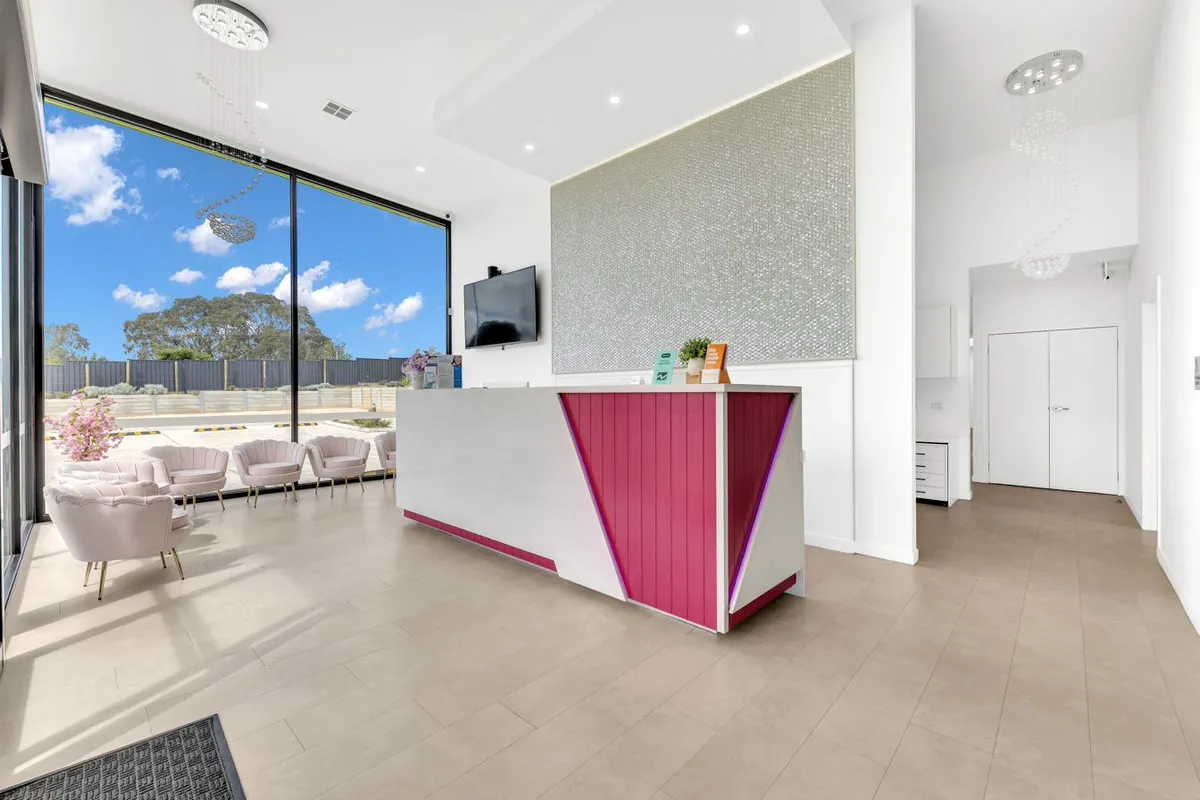 A calm Magical Smiles reception and waiting area — the kind of space where the conversation about your implant starts